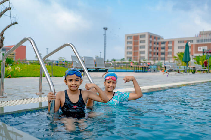 Student swimming in the school pool
