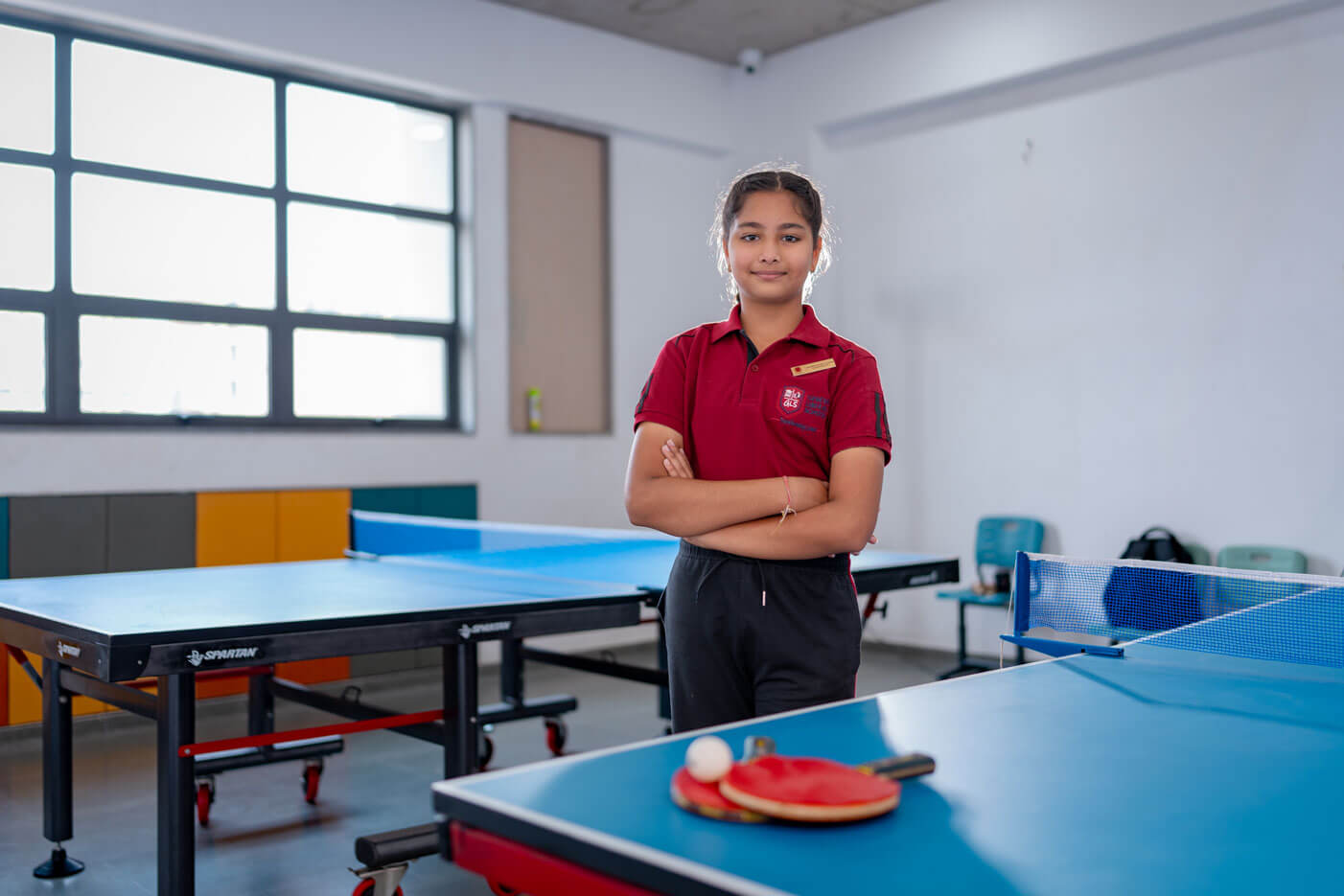Students playing table tennis at the school