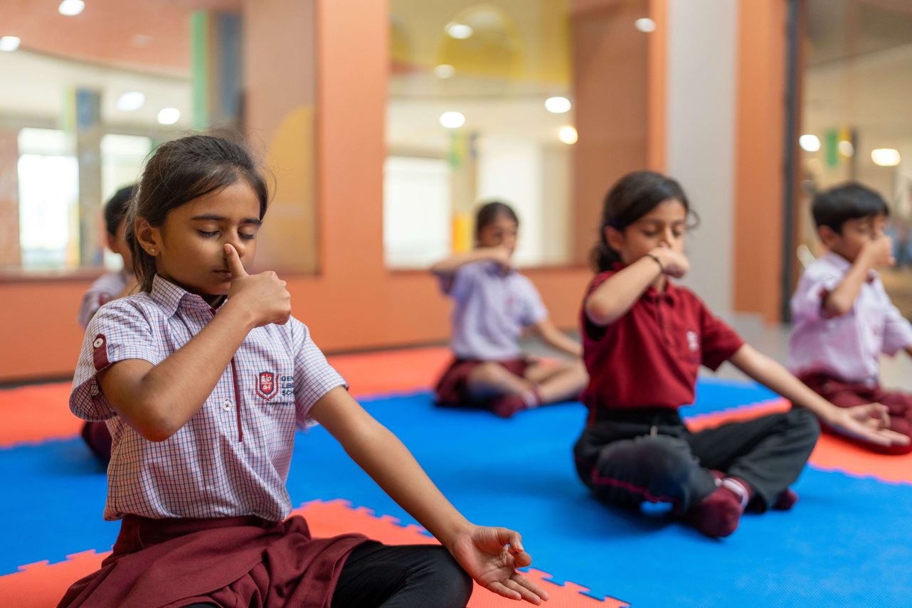 Students practising yoga at the school
